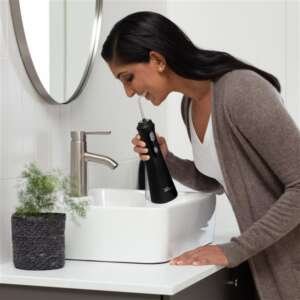 Waterpik Black Water Flosser Cordless Plus 4 Tips WP462